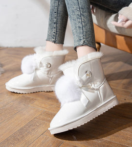 Shiny and velvet snow boots